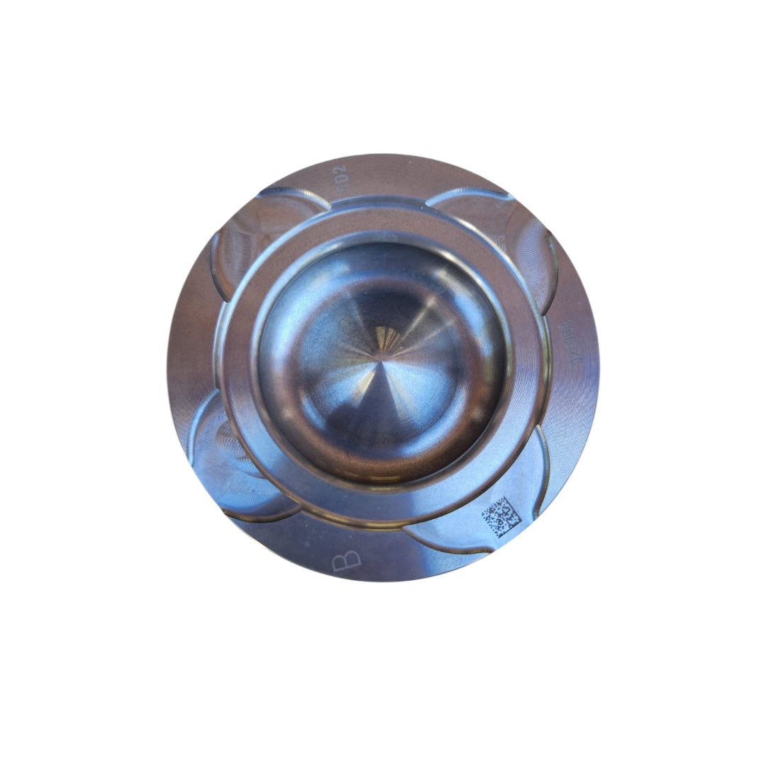 Top view of 7443660 Engine Piston Set compatible with Bobcat DM03, T86, E145, and Telehandlers