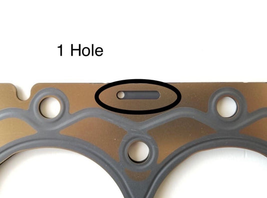 Close-up of DM02 head gasket variant with 1 hole indicator – verify before installation